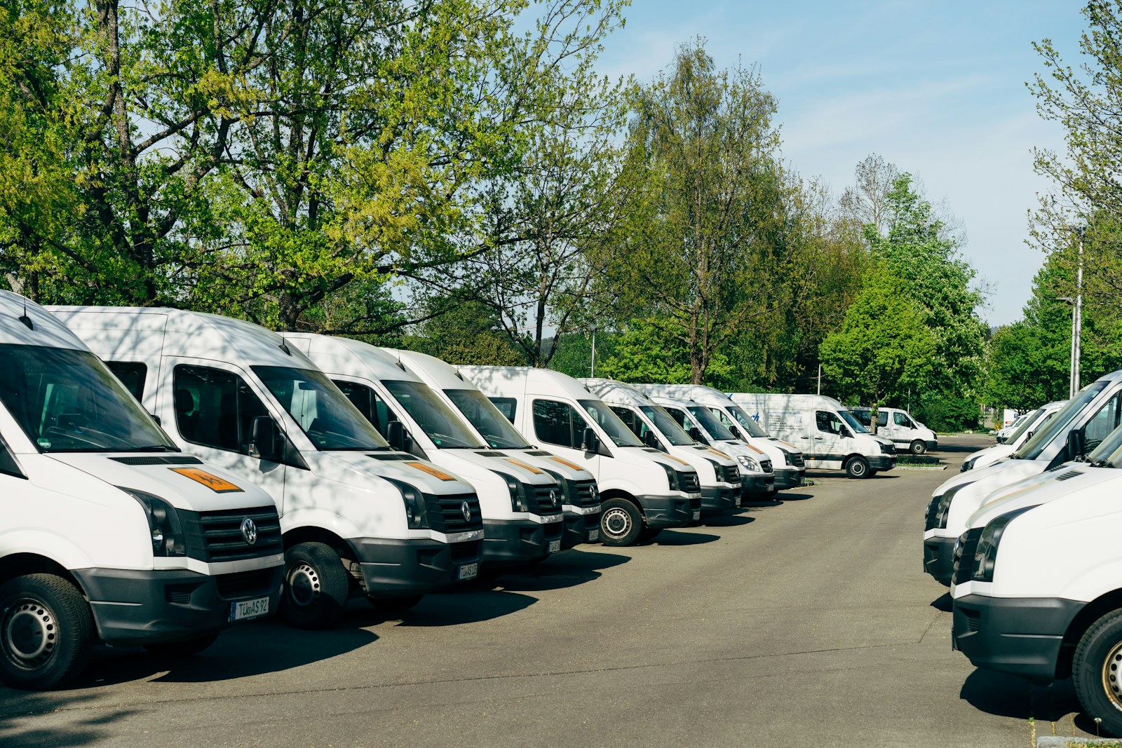 cars parked on parking lot during daytime, commercial auto